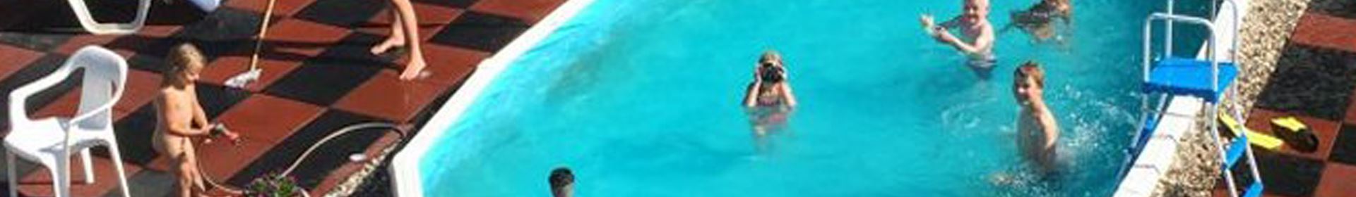  Ideal as rubber flooring on terraces and in gardens and parks etc. ErgoTile Quad rubber tiles in pool surroundings.